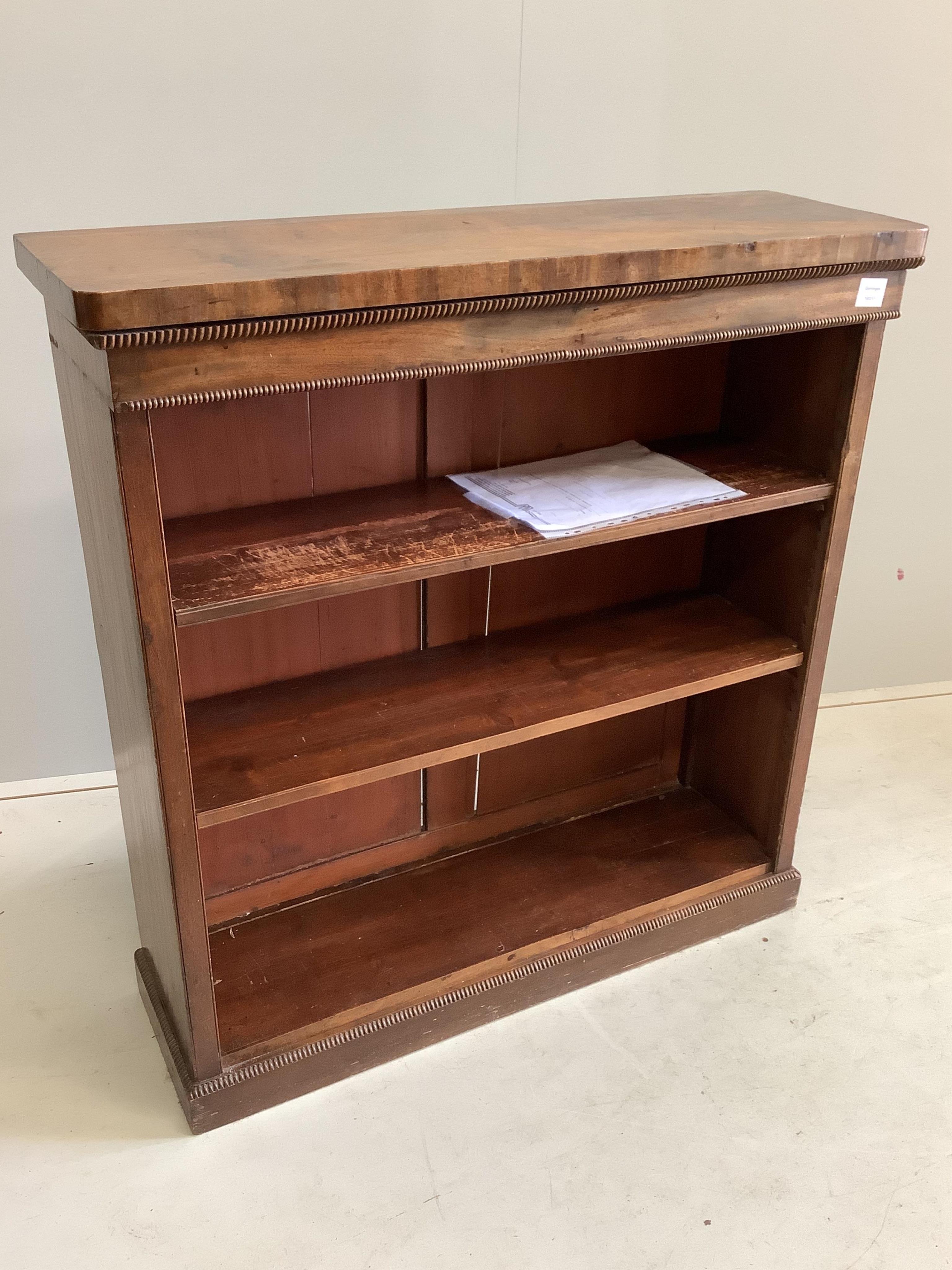 A Victorian mahogany open bookcase, with lift up lid revealing a hidden compartment underneath, width 96cm, depth 31cm, height 102cm. Condition - fair